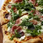 Taleggio, Prosciutto, and Arugula Pizza