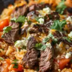 Creamy Queso Rice with Juicy Steak Strips